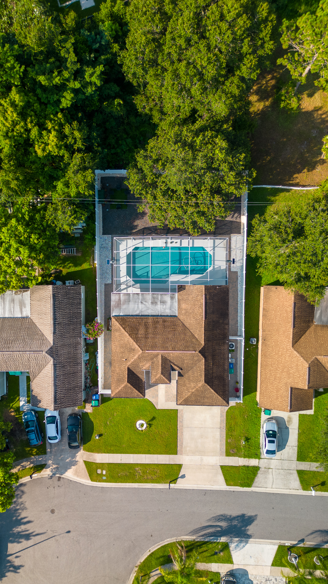 Aerial view of a property and surrounding landscape