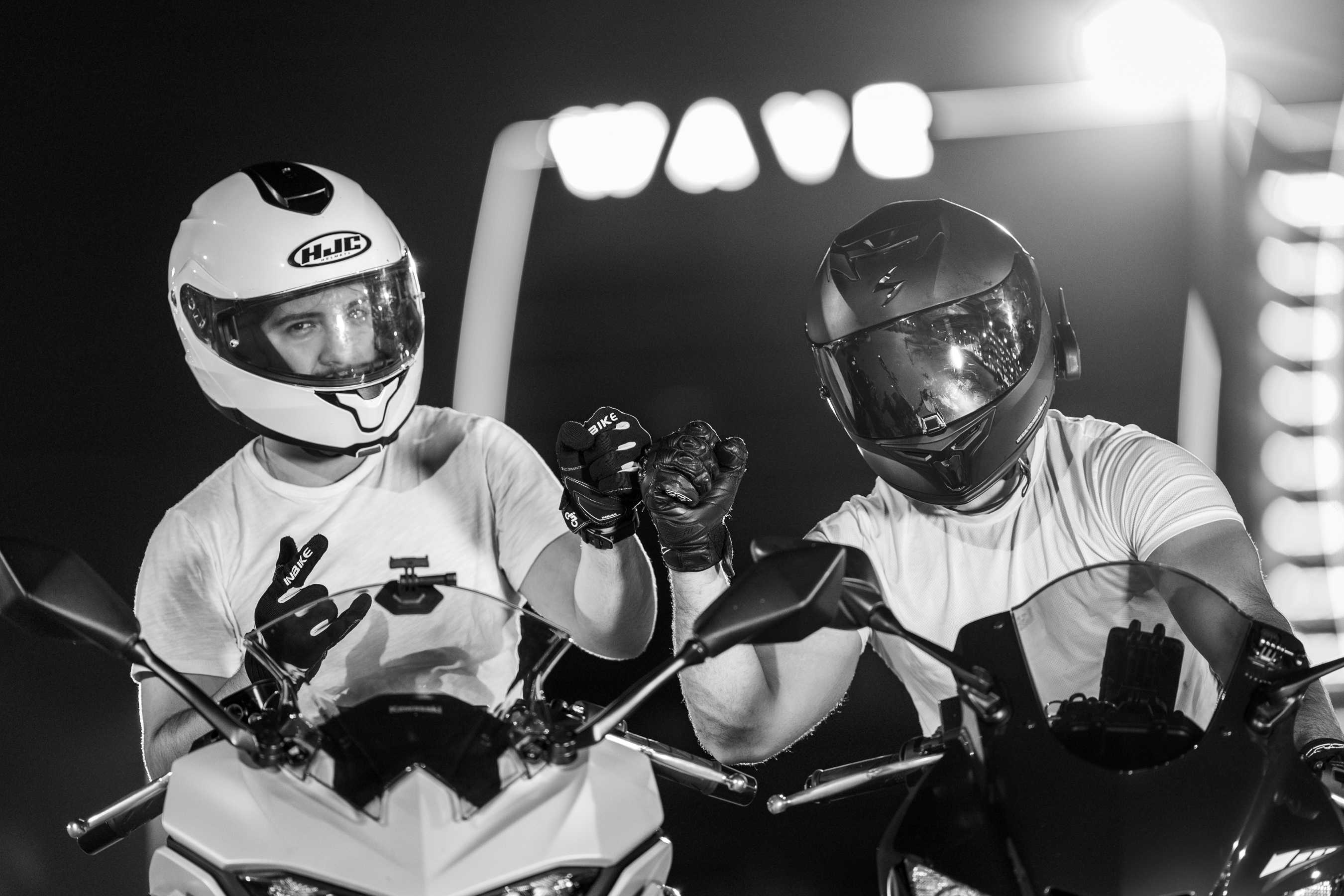 Black and white motorcycle riders