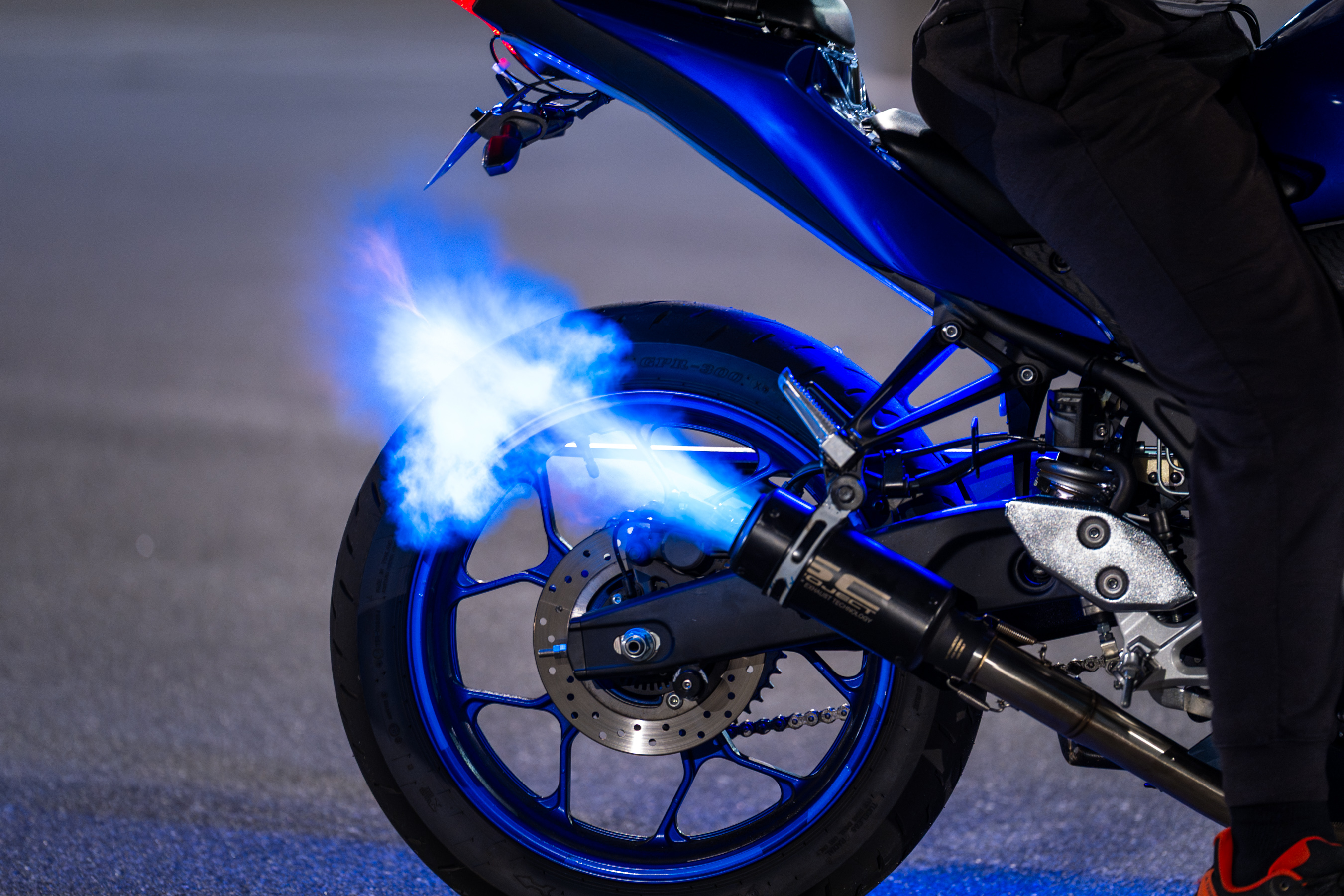 Blue motorcycle in motion