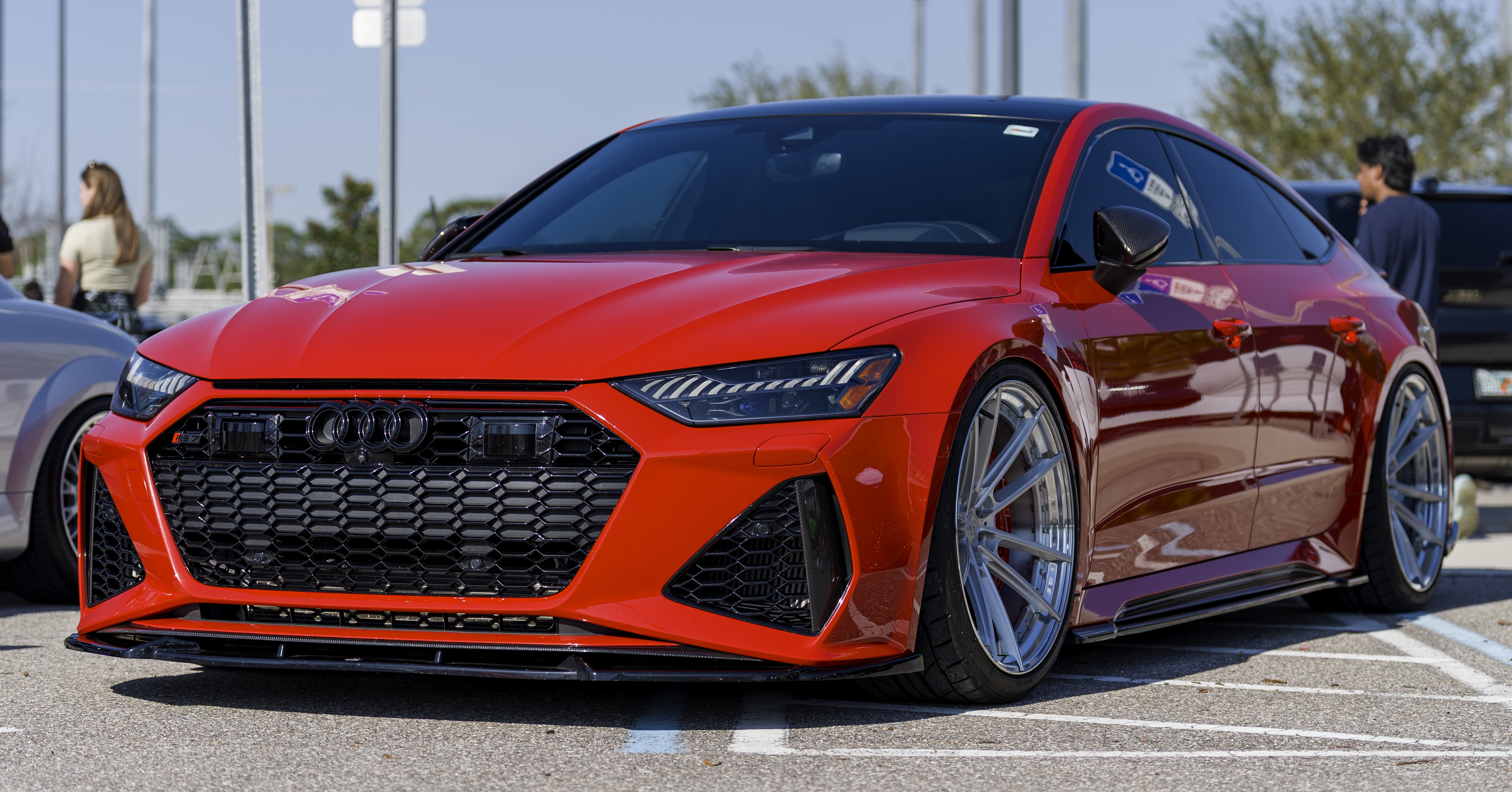 Red Audi RS7 photographed front three-quarter